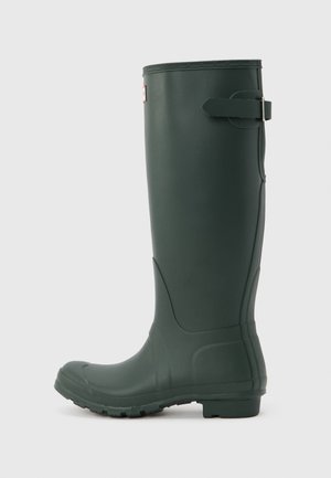 Dark green knee-high rubber boot with a buckle strap near the top, textured sole, and a smooth finish on a plain background.