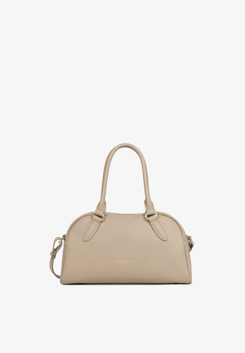 Sac à main en cuir beige avec deux poignées et une bandoulière amovible, marquage discret au centre devant.