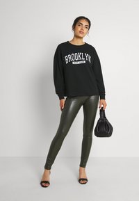 VILA VIRUST ORLEANS - Camisola - black