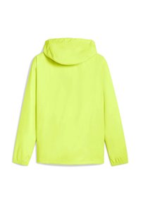 Giacca antipioggia gialla con cappuccio, realizzata in materiale leggero. Presenta polsini elasticizzati e una texture liscia senza motivi visibili o parti metalliche.