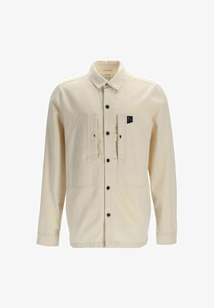 Kremo spalvos medvilninis švarkas, su sagčių užsegimu, dviem krūtinės kišenėmis ir mažame logotipo pažymėjimu. Tekstūruota medžiaga, su ilgomis rankovėmis.