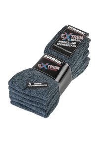 Dunkelgraue, strukturierte Socken gestapelt, mit einem schwarzen Etikett mit weißem und farbigem Text, auf dem steht "EXTREM STABIL" und "ohne Gummidruck".