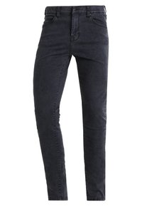Jeans skinny de mezclilla negra con un diseño ajustado, estilo de cinco bolsillos y una cinturilla estándar. Textura suave con sutiles detalles de costura.