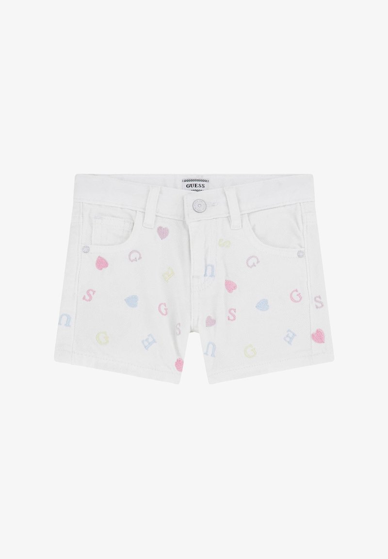Short blanc pour enfants avec des cœurs et des lettres aux couleurs pastel partout, avec poches avant et fermeture par bouton.