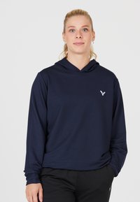 Marinblå hooded långärmad skjorta i mjukt material, med en liten silverlogotyp på bröstet och en avslappnad passform med långa ärmar.