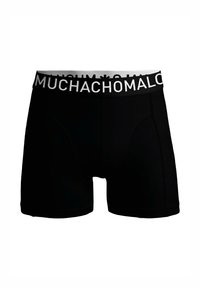 Boxer briefs negros con una cinturilla suave que presenta el logo en blanco "MUCHACHOMALO". Confeccionados en una tela suave con un ajuste ceñido y sin patrones.
