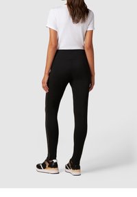 Oltre Leggings - Byxor - black