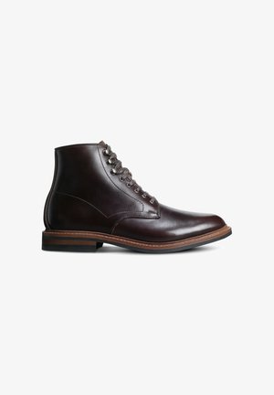 Dark brown leather ankle boot with round toe, lace-up front, and stacked heel on a white background.
