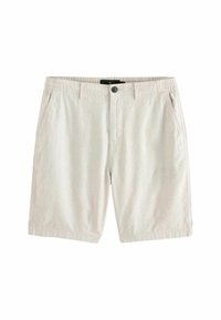 Shorts décontractés beige clair avec bouton avant, côtés élastiques à la taille, passants de ceinture et poches latérales sur fond blanc.