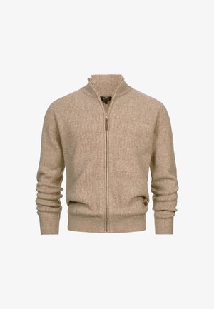 Sudadera cremosa con cremallera hecha de tela acanalada, con un cuello alto, mangas largas y un pequeño detalle de cuero en el dobladillo.