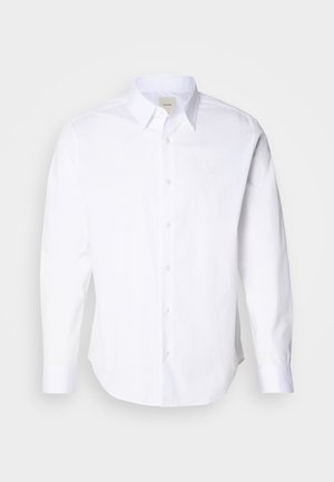 Witte lange mouwen shirt van katoen. Heeft een button-down kraag, een voorpaneel met knoppen en een klein logo geborduurd op de borst.