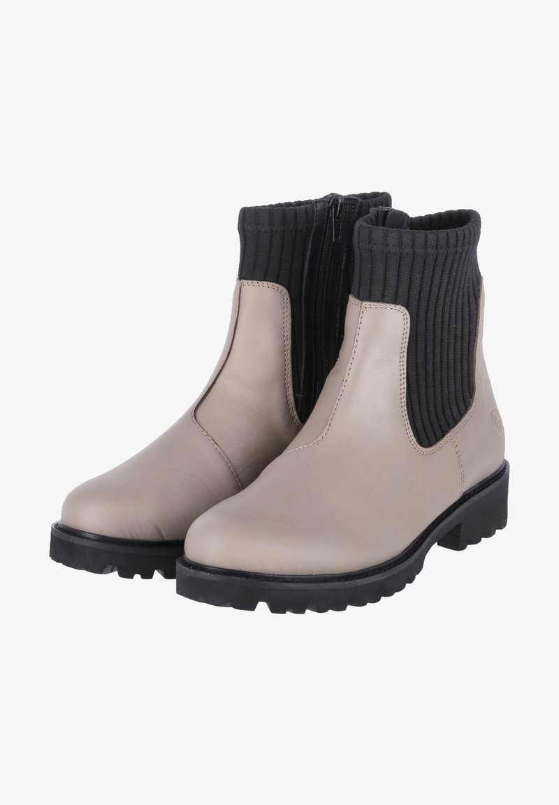 Paire de bottines beiges avec des poignets en tricot côtelé noir, des fermetures éclair latérales et des semelles épaisses noires à rainures.