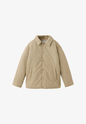 Veste matelassée beige avec col, fermeture par boutons-pression et deux poches avant, conçue pour temps froid.