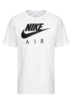 T-shirt en coton blanc avec un grand logo Nike noir et le texte "AIR" à l'avant. Manches courtes et col rond.