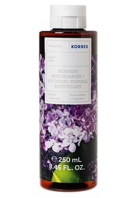 Brun plastflaska för kroppstvätt med vit kork. Etiketten har lila blommor med "Korres Renewing Body Cleanser" i grå text. 250 mL.