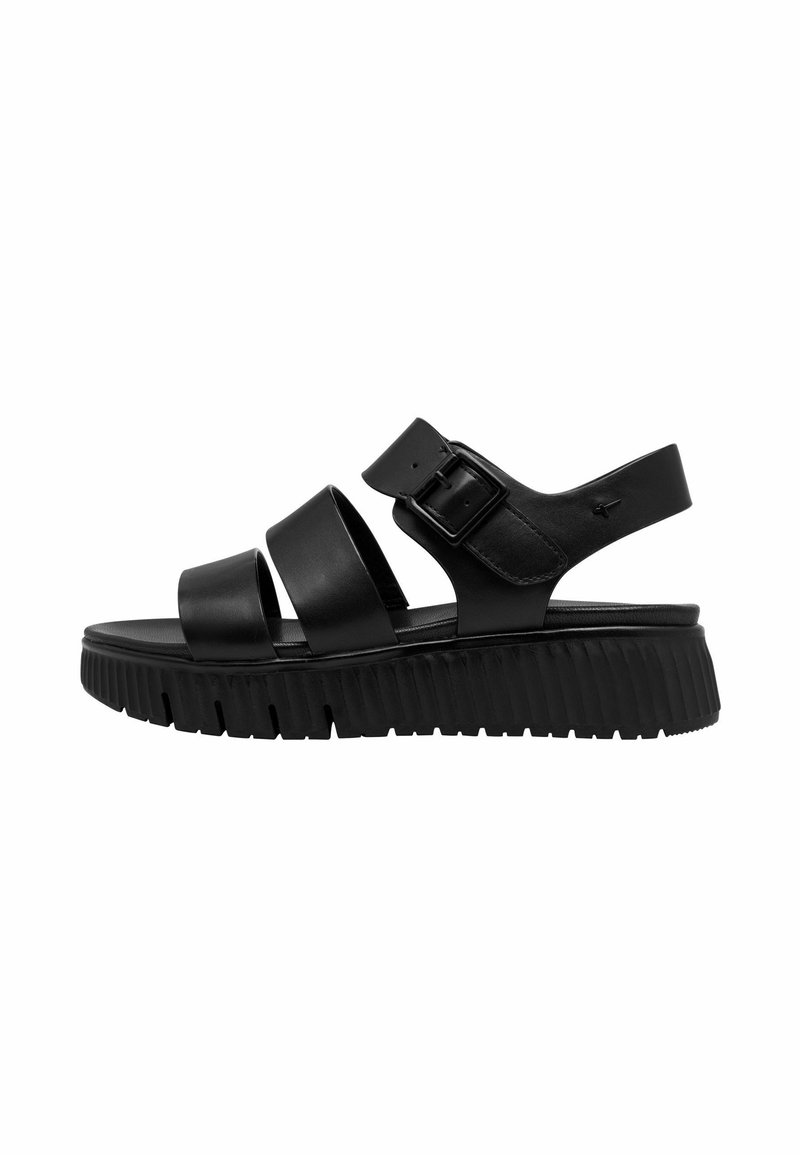 Schwarze Ledersandalen mit drei breiten Riemen, einer Schnallenverschluss und einer dicken Gummisohle mit gerillter Textur.