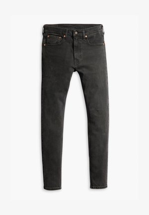 Černé džíny z denimu s úzkým střihem, zdobené měděnými nitěmi, s kovovým zipem a pěti kapsami. Materiál má hladkou, mírně vybledlou texturu.