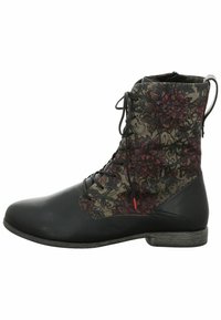 Botines con cordones, con puntera de cuero negro, parte superior de textil estampado con diseño floral en colores suaves, y tacón bajo apilado.