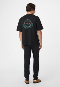Fila SAGANO REGULAR - Träningsbyxor - black
