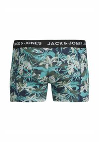 Boxer en motif tropical de feuilles teal, noir et blanc. Doté d'une ceinture noire avec le logo « JACK & JONES ». Texture de tissu lisse.