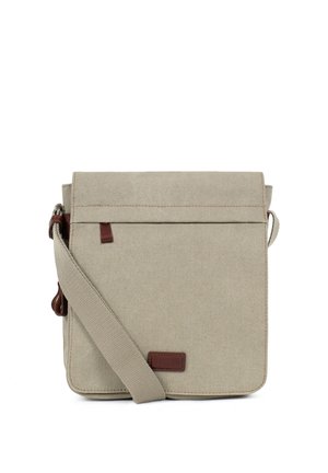 Sac bandoulière en tissu beige avec fermeture à rabat, sangle d'épaule réglable et petits détails en cuir marron sur le devant et sur la sangle.