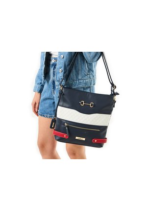 Navy synthetic handbag with white quilted design and red accents. Features gold hardware and adjustable straps, including a zippered pocket.