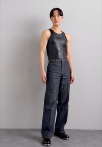 Helmut Lang CARPENTER - Avar lõikega teksad - raw indigo