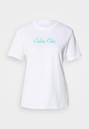 White cotton t-shirt with short sleeves and a crew neckline, featuring a light blue "Calvin Klein" logo across the chest.