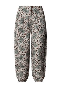 Luźne spodnie z elastycznym mankietem, o białej bazie z misternymi zielono-brązowymi kwiatowymi i geometrycznymi wzorami.