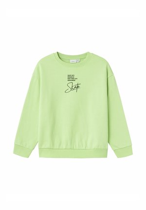 Sudadera verde claro con puños y dobladillo acanalados. Presenta texto negro: "SKATE DPT. BROOKLYN NEW YORK CITY WORLDWIDE" y un logo artístico de "Skate".