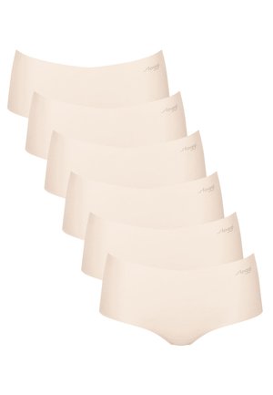 Nude sömlösa hipsterkillar visade i en staplad arrangement, tillverkade av mjukt tyg, med en slät textur och minimal varumärkning.
