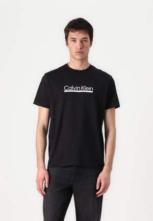 UNISEX - Print T-shirt - black