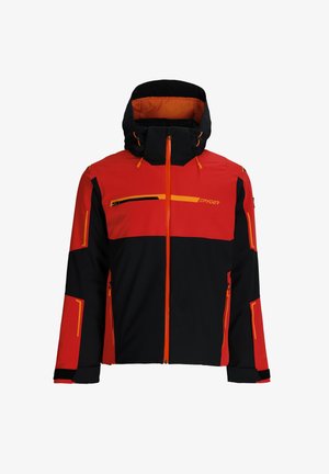 Rode en zwarte skijas met een capuchon. Voorzien van oranje accenten, een voorrits en meerdere zakken met contrasterende gekleurde randen. Waterdicht materiaal.