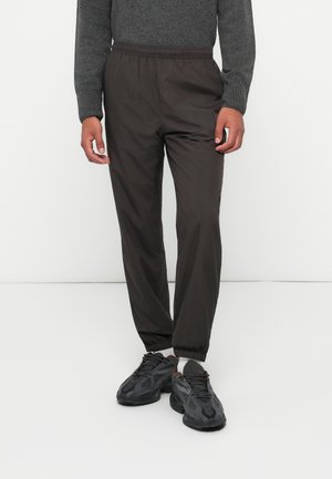 XH8909_SKB - Jogginghose - black