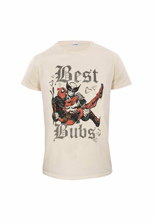 Cream cotton t-shirt featuring an illustration of Deadpool and Wolverine with the text “Best Bubs” in bold, stylized letters.