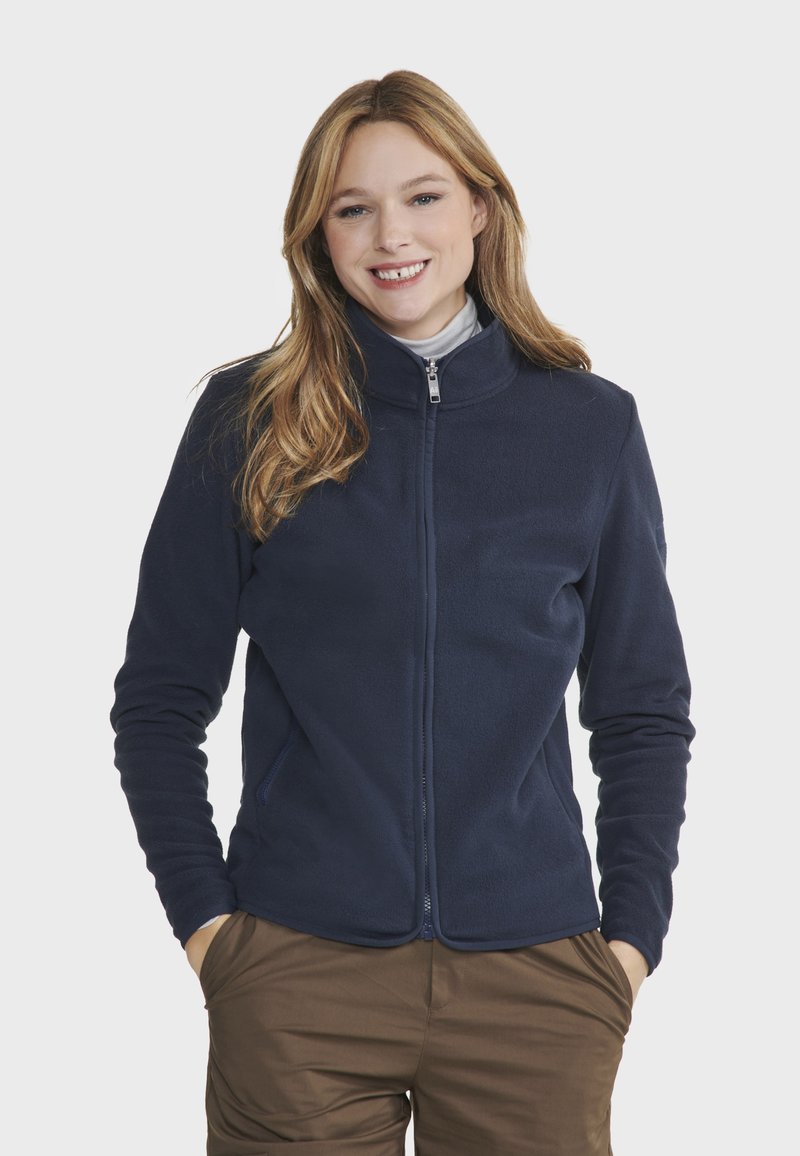 Veste en polaire bleu marine avec un col haut et une fermeture éclair sur le devant, dotée de manches longues et de deux poches latérales pour plus de praticité.