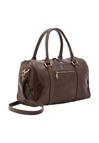 Bruine leren handtas met dubbele handvaten, verstelbare schouderriem, ritsluiting en een voorzak met rits voor extra opbergruimte. Gladde textuur.