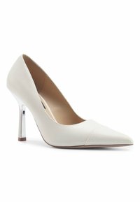 White leather high-heeled pump with a pointed toe, smooth texture, and a shiny silver heel accent, featuring a curved silhouette.