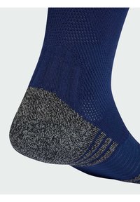 Ναυτικό μπλε κάλτσα με υφή υφάσματος, γκρι τακούνι με μοτίβο και λείο, ribbed ύψωμα. Ο σχεδιασμός τονίζει την άνεση και την αντοχή.