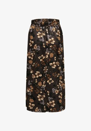 Pantalon large noir avec motif floral beige et violet clair et taille élastique.