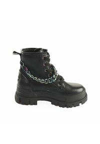 Black leather ankle boot with a chunky sole, featuring colorful metal chain accents and round laces through multi-colored eyelets.