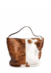 Borsa a tracolla in pelle di mucca marrone e bianca con una texture morbida, dotata di una singola tracolla in pelle e un design ampio.