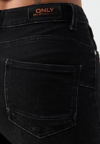 ONLY Petite ONLPOWER MID PUSH UP - Jeans Skinny Fit - washed black