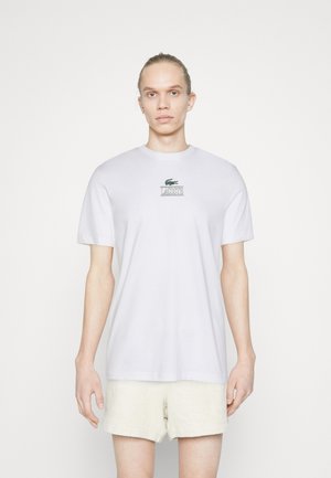 SUBTLE LOGO - T-shirt med print - white