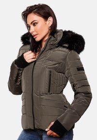 Puffer jacket in olive green with a black faux fur hood, zippered front, and ribbed cuffs; features quilted sections and zip pockets.
