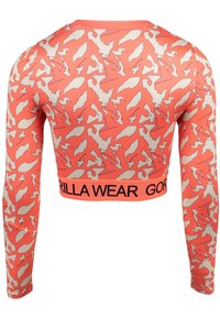 Langarm crop top in koraal met een beige abstract visontwerp. Heeft een brede zwarte tailleband met de tekst "GORILLA WEAR". Soepele, rekbare stof.