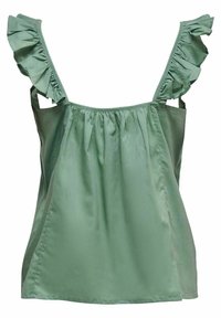 Blouse verte sans manches avec bretelles volantées et tissu lâche et froncé au niveau de l'encolure et du dos.
