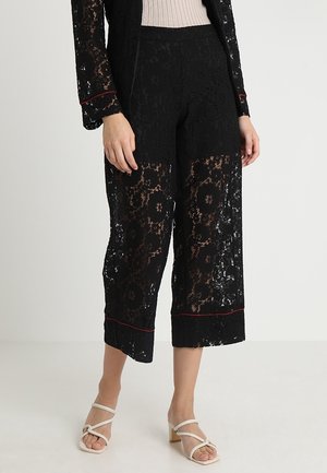 Spodnie materiałowe