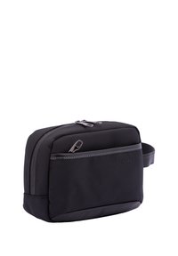 Bag da toeletta nera realizzata in nylon texturizzato, con chiusura a zip, tasca frontale con dettaglio di cucitura e maniglia laterale per un facile trasporto.
