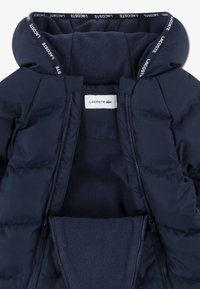Lacoste SOLID PRAM - Combinaison de ski - marine